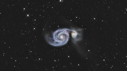 <h5>Galactic collision: Whirlpool Galaxy</h5>